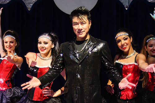 Magician with dancers